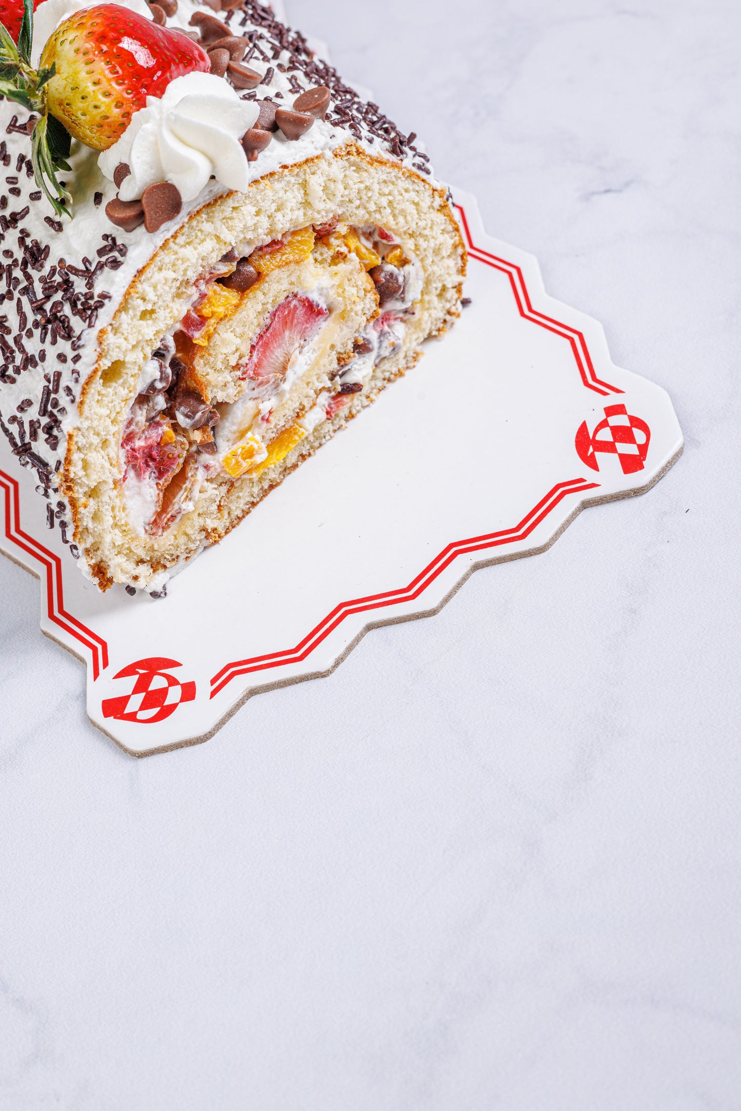 TRONCO RELLENO DE CREMA CHANTILLI/FRESAS/MELOCOTONES